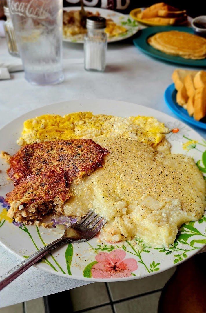 Plates of Southern sides on a casual table.